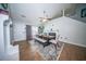 Bright dining area featuring wood floors, fireplace, and table with seating at 229 Lindy Creek Rd, Goose Creek, SC 29445