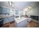 Open-concept kitchen and living room layout with granite countertops and stainless steel dishwasher at 229 Lindy Creek Rd, Goose Creek, SC 29445