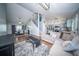 Open-concept living room with kitchen, dining, living room, and staircase at 229 Lindy Creek Rd, Goose Creek, SC 29445