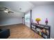 Bright living room featuring wood floors and a black bookshelf with lots of storage space at 229 Lindy Creek Rd, Goose Creek, SC 29445
