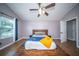 This main bedroom features vaulted ceilings, a ceiling fan and lots of natural light at 229 Lindy Creek Rd, Goose Creek, SC 29445