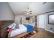 This main bedroom features vaulted ceilings, a ceiling fan and an attached bathroom at 229 Lindy Creek Rd, Goose Creek, SC 29445