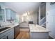 View of the kitchen leading to the living room with granite countertops and stainless steel appliances at 229 Lindy Creek Rd, Goose Creek, SC 29445