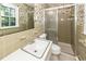 Bathroom featuring a vanity, toilet, and shower with a sliding glass door at 2320 Wofford Rd, Charleston, SC 29414