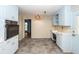 A quaint kitchen features vintage appliances, blue cabinets, and a view to another room at 2320 Wofford Rd, Charleston, SC 29414