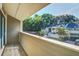 Balcony view showcasing the surrounding neighborhood and wooded area at 2334 Treescape Dr # 2006, Charleston, SC 29414