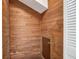 Basement featuring wooden walls and a door leading to storage or crawl space at 2334 Treescape Dr # 2006, Charleston, SC 29414