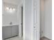 The bathroom features a modern vanity with gray cabinetry and updated light fixtures at 2334 Treescape Dr # 2006, Charleston, SC 29414