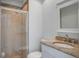 Bathroom featuring granite countertops, a white vanity, toilet, and a glass shower at 2334 Treescape Dr # 2006, Charleston, SC 29414