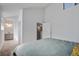 Bright bedroom features neutral walls, carpet flooring, and ensuite bathroom at 2334 Treescape Dr # 2006, Charleston, SC 29414