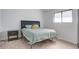 Bedroom showcasing natural light, a bed, bedside table, and a window at 2334 Treescape Dr # 2006, Charleston, SC 29414