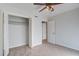 Bedroom with ceiling fan, closet, neutral paint, and doorway to the ensuite bathroom at 2334 Treescape Dr # 2006, Charleston, SC 29414