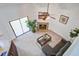 Bright living room with modern decor, fireplace, and sliding glass doors to a balcony at 2334 Treescape Dr # 2006, Charleston, SC 29414