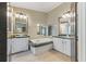 Bathroom with a soaking tub, green counter tops, and double vanity at 250 W Medina St, Summerville, SC 29483