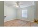 Cozy bedroom with wood-look flooring and a bright window at 250 W Medina St, Summerville, SC 29483