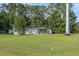 Well maintained single-story home with vinyl siding and a spacious front yard at 250 W Medina St, Summerville, SC 29483