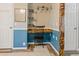 Custom work space area with desk, shelving and decorative trim at 250 W Medina St, Summerville, SC 29483