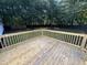 A new wood back deck overlooks a spacious backyard at 260 Lake Dr, Summerville, SC 29483
