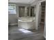 Bathroom boasts a large soaking tub with an adjacent walk-in closet at 260 Lake Dr, Summerville, SC 29483