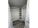 Walk-in closet features built-in corner shelving and a clothes rod at 260 Lake Dr, Summerville, SC 29483