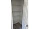 Bedroom closet has ample shelving and wood-look floors at 260 Lake Dr, Summerville, SC 29483