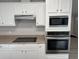 A detailed view of the kitchen appliances, including the microwave, oven, and stovetop at 260 Lake Dr, Summerville, SC 29483