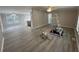 Spacious living room showing an open floor plan with light gray walls and wood-look flooring at 260 Lake Dr, Summerville, SC 29483