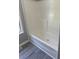Bathroom shower features a white tub surround and tile walls at 260 Lake Dr, Summerville, SC 29483