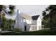 Stunning exterior elevation of a white two-story home, showcasing its inviting front porch and well-manicured landscaping at 2640 Battle Trail Dr, Johns Island, SC 29455