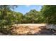 View of cleared lot surrounded by trees, ready for building a dream home at 2640 Battle Trail Dr, Johns Island, SC 29455
