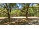 View of cleared lot surrounded by trees, ready for building a dream home at 2640 Battle Trail Dr, Johns Island, SC 29455