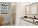 Elegant bathroom featuring granite countertops, a modern vanity, and a glass shower at 2645 Gnarled Pine, Seabrook Island, SC 29455