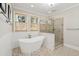 Bathroom with freestanding tub and tiled shower at 2645 Gnarled Pine, Seabrook Island, SC 29455
