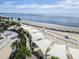 Expansive beachfront with shade structures and lounge chairs, offering ultimate relaxation by the ocean at 2645 Gnarled Pine, Seabrook Island, SC 29455