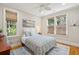 Cozy bedroom features ample light from windows, with stylish bedding and comfortable decor at 2645 Gnarled Pine, Seabrook Island, SC 29455