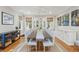 Bright dining room with seating for ten and views to the exterior at 2645 Gnarled Pine, Seabrook Island, SC 29455