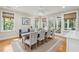 Dining room featuring hardwood floors, natural light, and seating for eight at 2645 Gnarled Pine, Seabrook Island, SC 29455