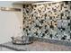 Close-up of kitchen countertop and backsplash, showing granite counters and tile backsplash at 2645 Gnarled Pine, Seabrook Island, SC 29455