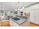 Spacious kitchen with stainless steel appliances, granite countertops, and cooking island at 2645 Gnarled Pine, Seabrook Island, SC 29455