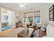 Living room featuring neutral walls, hardwood floors, and window coverings at 2645 Gnarled Pine, Seabrook Island, SC 29455