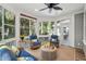 Inviting screened porch with views to the exterior and comfortable seating at 2645 Gnarled Pine, Seabrook Island, SC 29455
