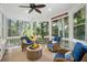 Screened porch featuring comfortable seating, views and ceiling fan at 2645 Gnarled Pine, Seabrook Island, SC 29455