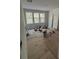 Unfinished bedroom with light wood flooring, natural light, and three windows at 2706 Old Oak Walk, Seabrook Island, SC 29455