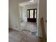 A view of the home's entryway with newly installed herringbone pattern wood floors at 2706 Old Oak Walk, Seabrook Island, SC 29455