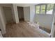 The hallway displays beautiful hardwood flooring, and several doors to other rooms at 2706 Old Oak Walk, Seabrook Island, SC 29455