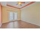 Comfortable bedroom features hardwood floors, neutral paint colors, and a ceiling fan at 271 Village Stone Cir, Summerville, SC 29486