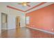 Spacious bedroom features a ceiling fan, hardwood floors, and an en-suite bathroom entrance at 271 Village Stone Cir, Summerville, SC 29486