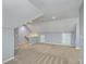 Open bonus room with neutral carpet, gray walls, recessed lighting, and access to a stairway and storage area at 271 Village Stone Cir, Summerville, SC 29486