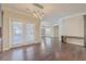 Bright dining area with French doors, hardwood floors, and access to the rest of the home at 271 Village Stone Cir, Summerville, SC 29486