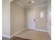 Foyer with tile flooring, crown molding, and neutral paint at 271 Village Stone Cir, Summerville, SC 29486